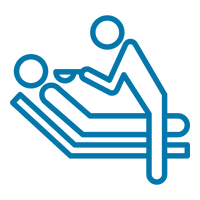 A blue line icon depicting a caregiver or therapist standing beside a reclining person on a bed, shown on a transparent background.